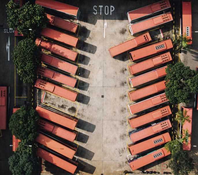 Picture Of Buses Parked At A Depot